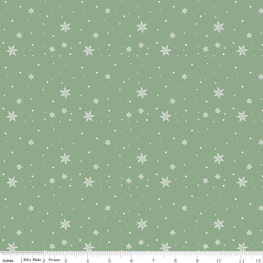 Winnie-the-Pooh Christmas Snowflakes Green Fabric From Riley Blake Designs
