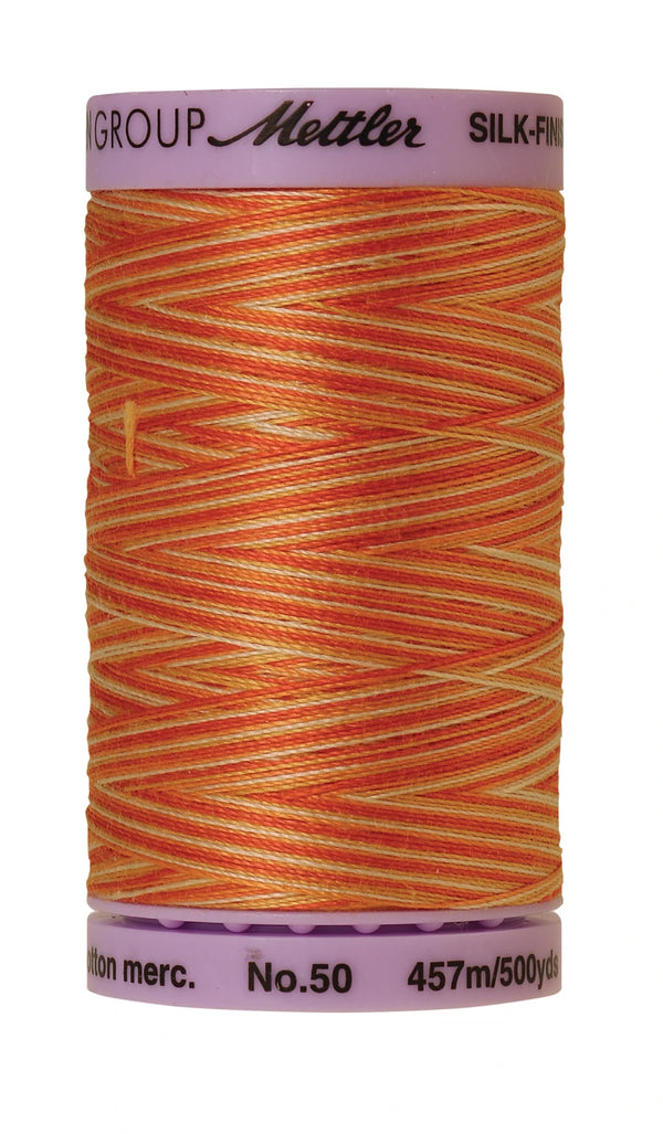 Mettler 9834 Silk-Finish 50wt Variegated Cotton Thread 500yd/457M Rust Ombre